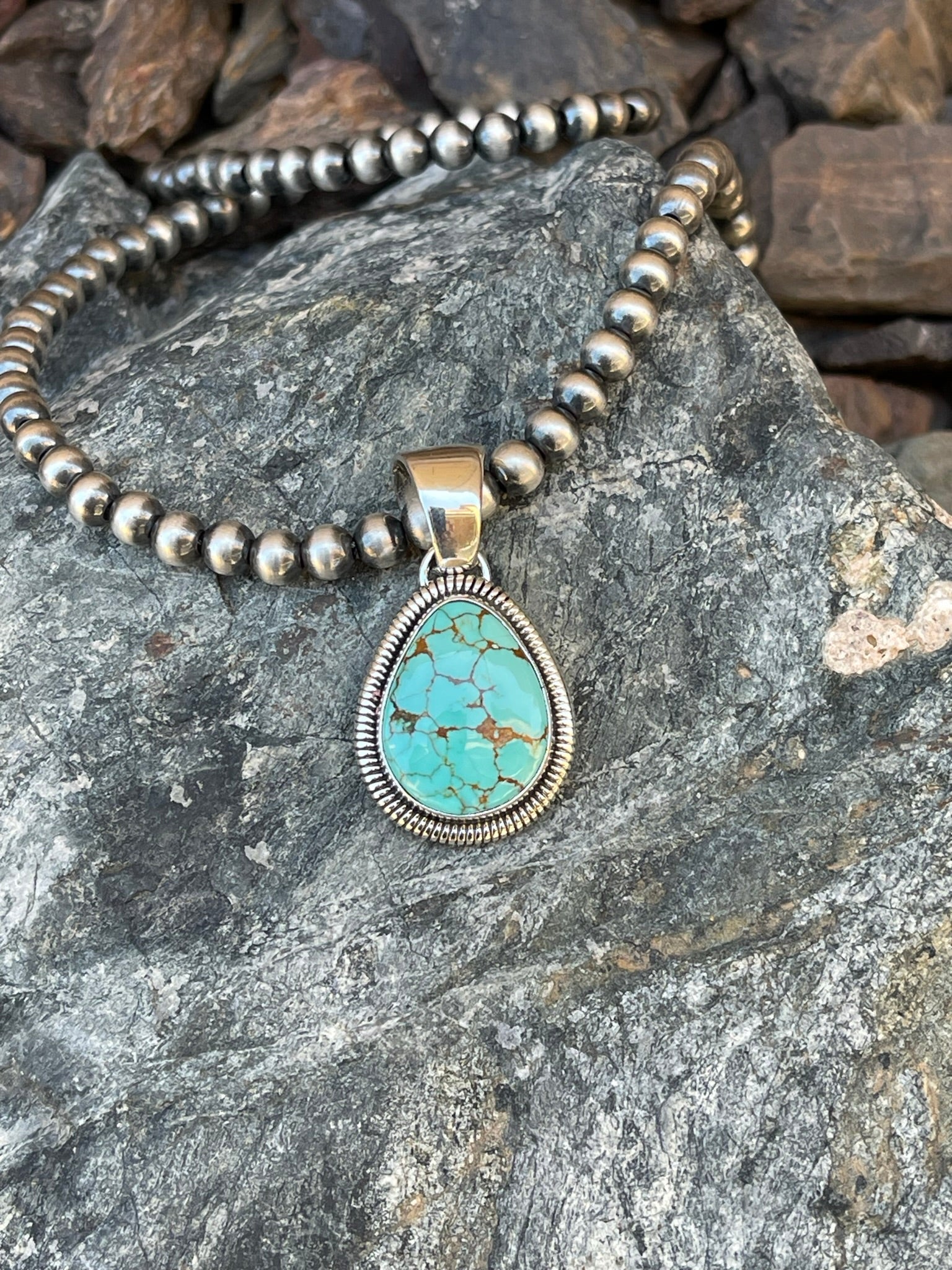 Handmade Sterling Silver Number Eight Turquoise Pendant with Coil Detail