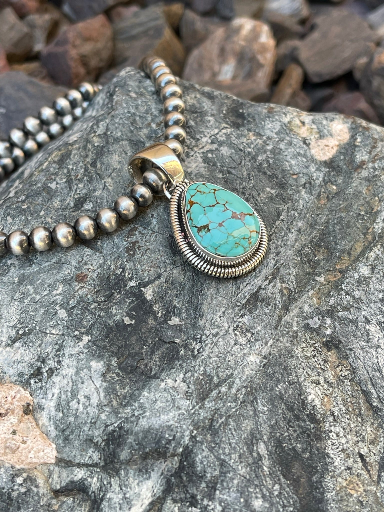 Handmade Sterling Silver Number Eight Turquoise Pendant with Coil Detail