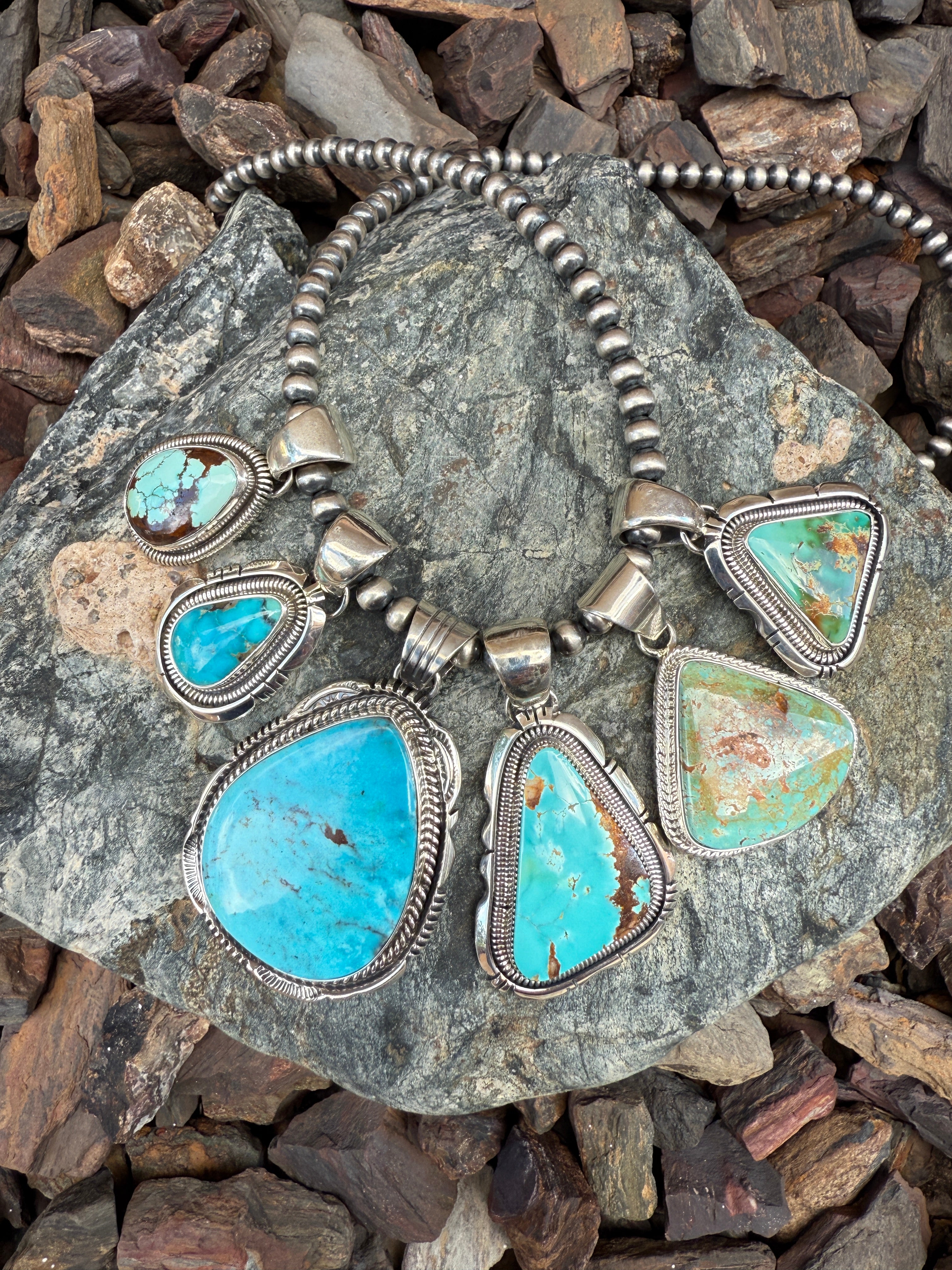 Handmade Sterling Silver Triangle Cut Royston Turquoise Pendant with Coil Trim