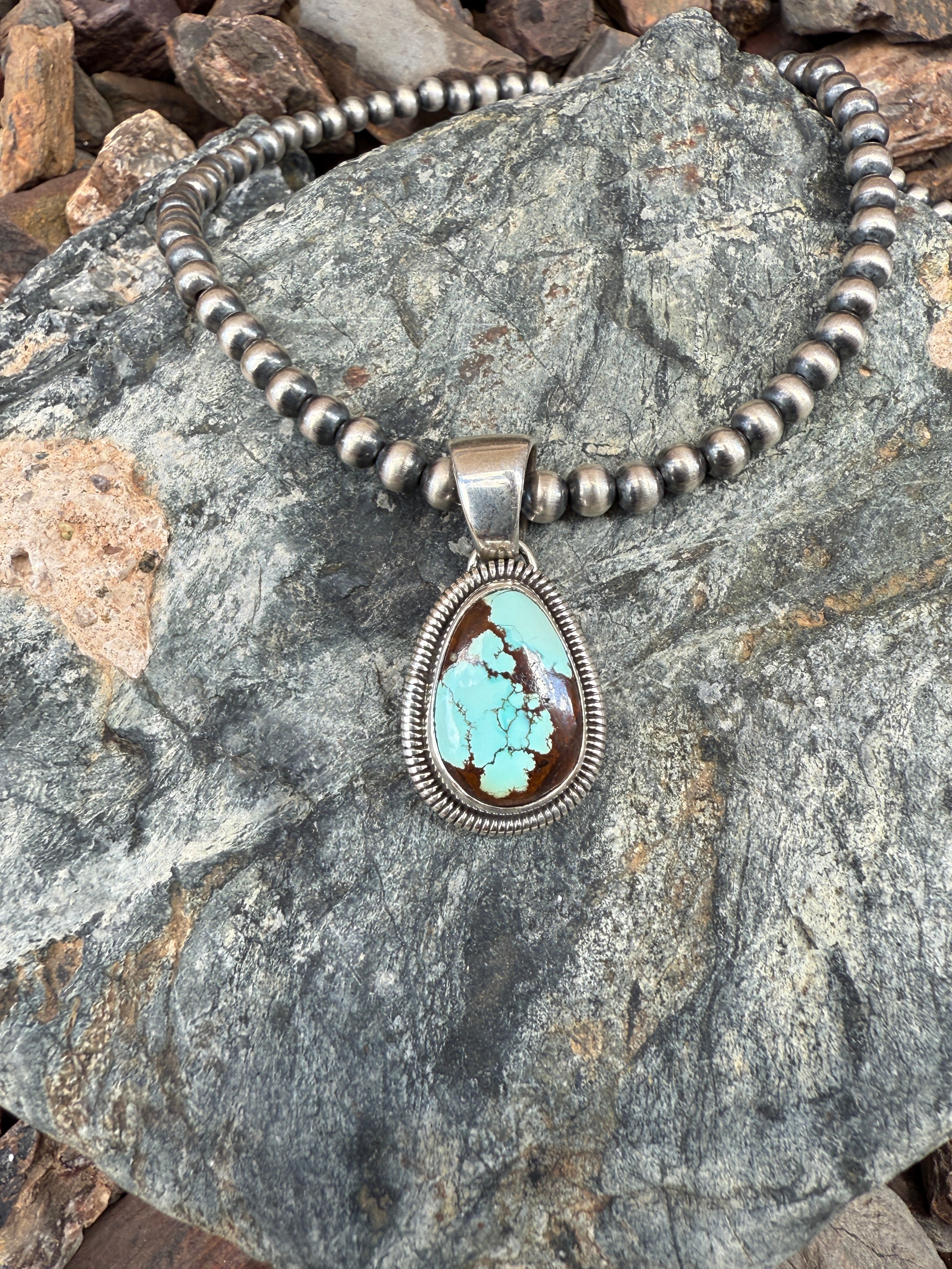 Handmade Sterling Silver Number Eight Turquoise Pendant with Coil Trim