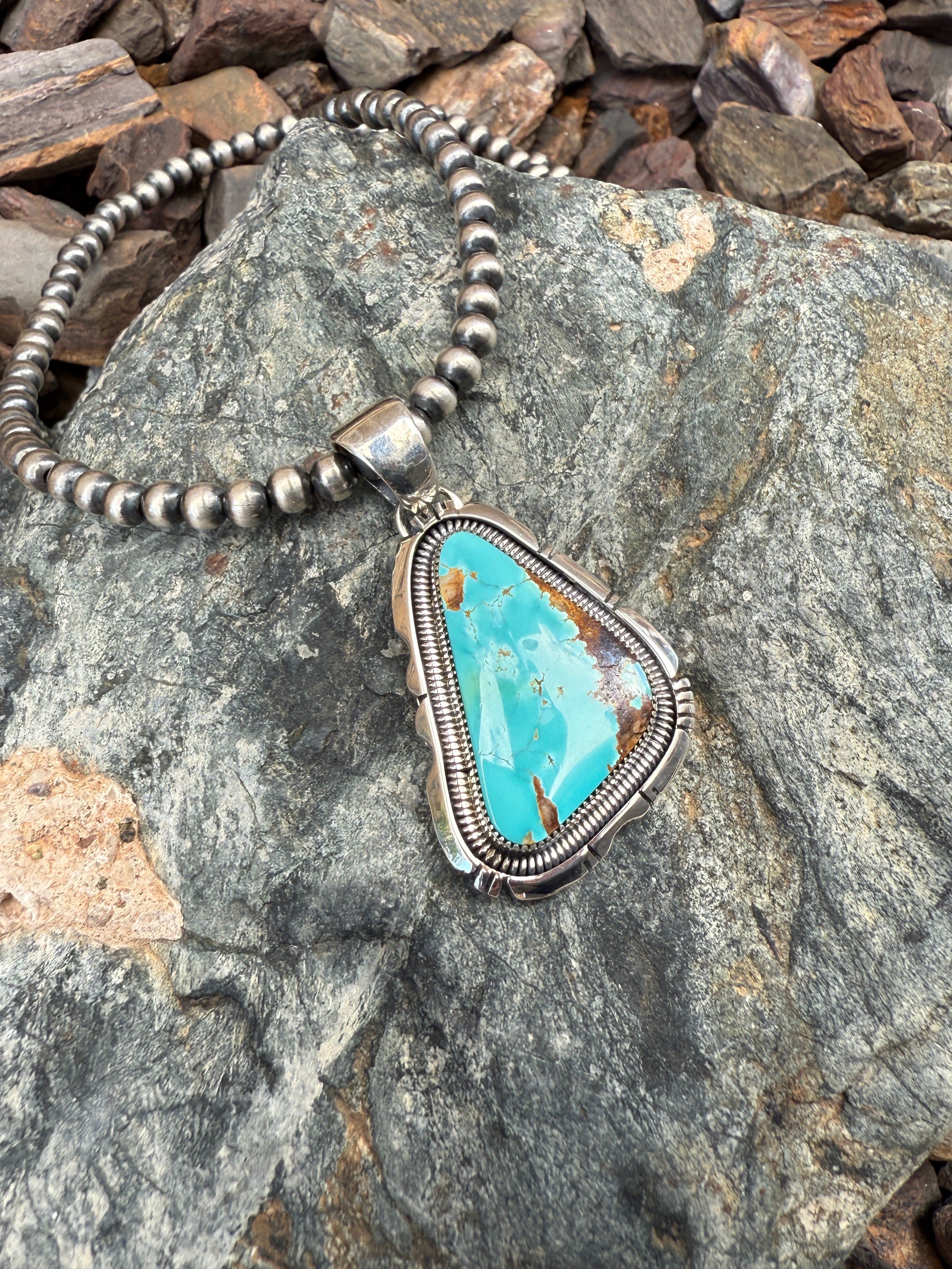 Handmade Sterling Silver Kingman Turquoise Pendant with Coil Trim