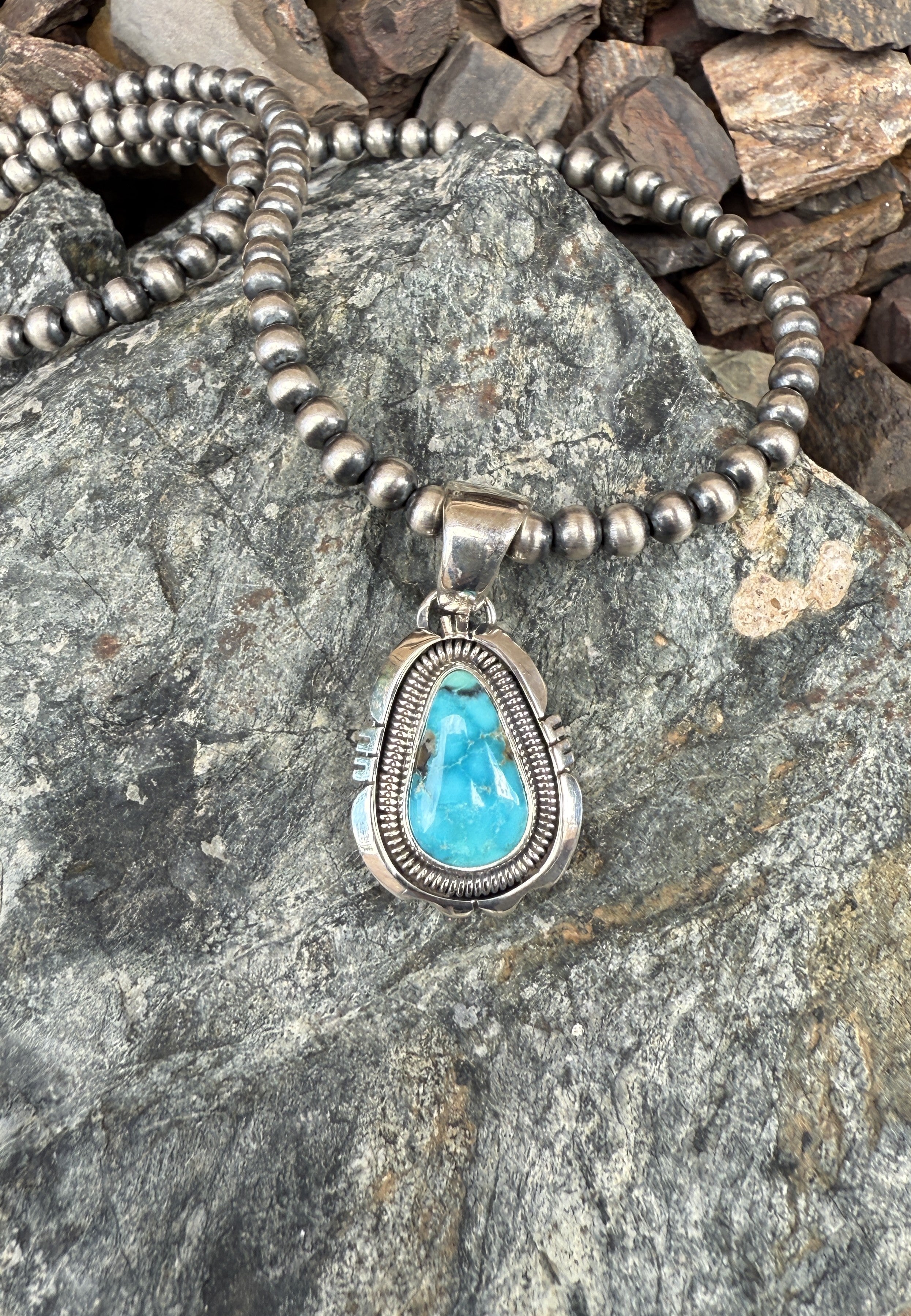 Handmade Sterling Silver Turquoise Mountain Pendant with Coil Detail