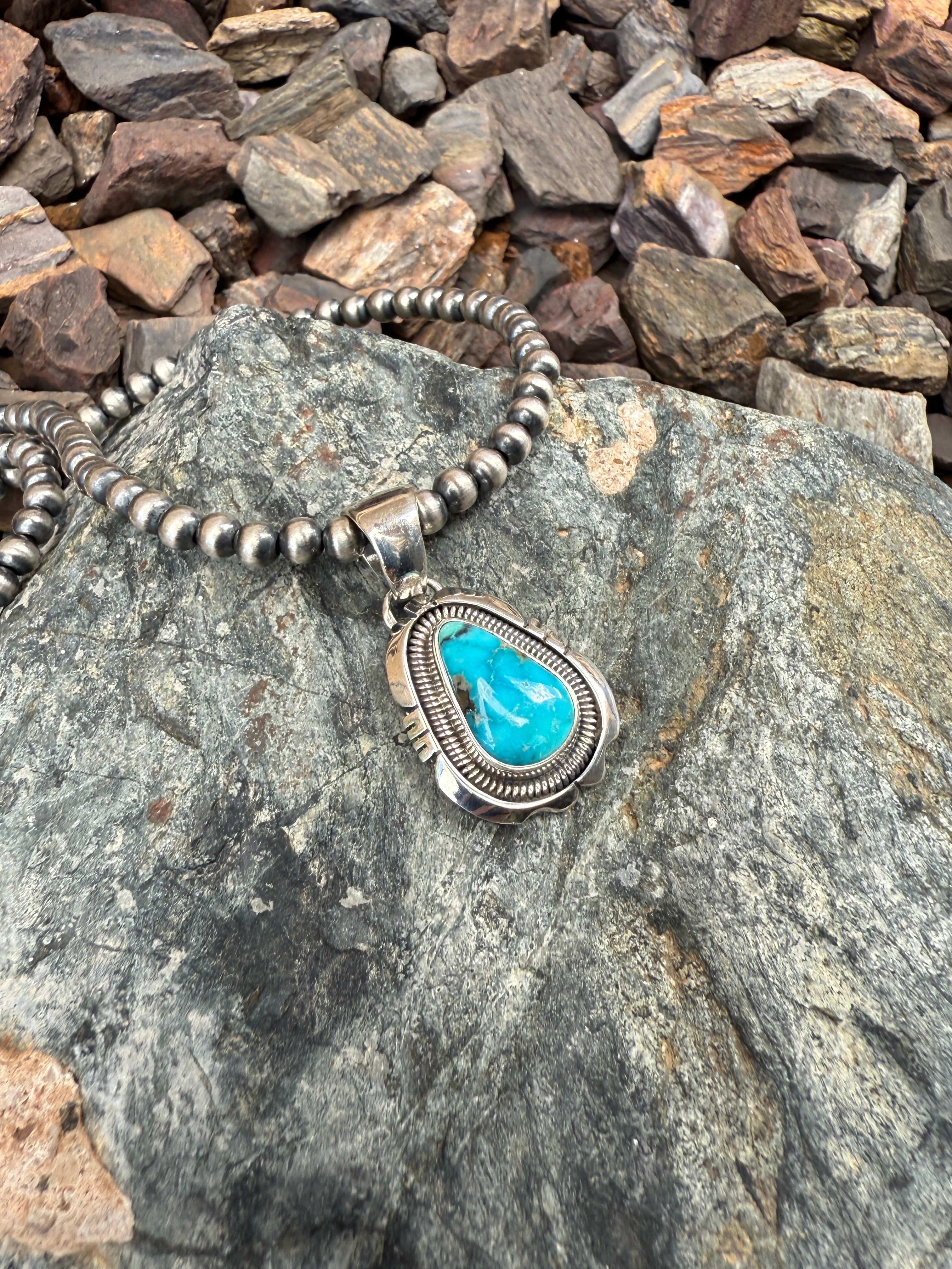Handmade Sterling Silver Turquoise Mountain Pendant with Coil Detail