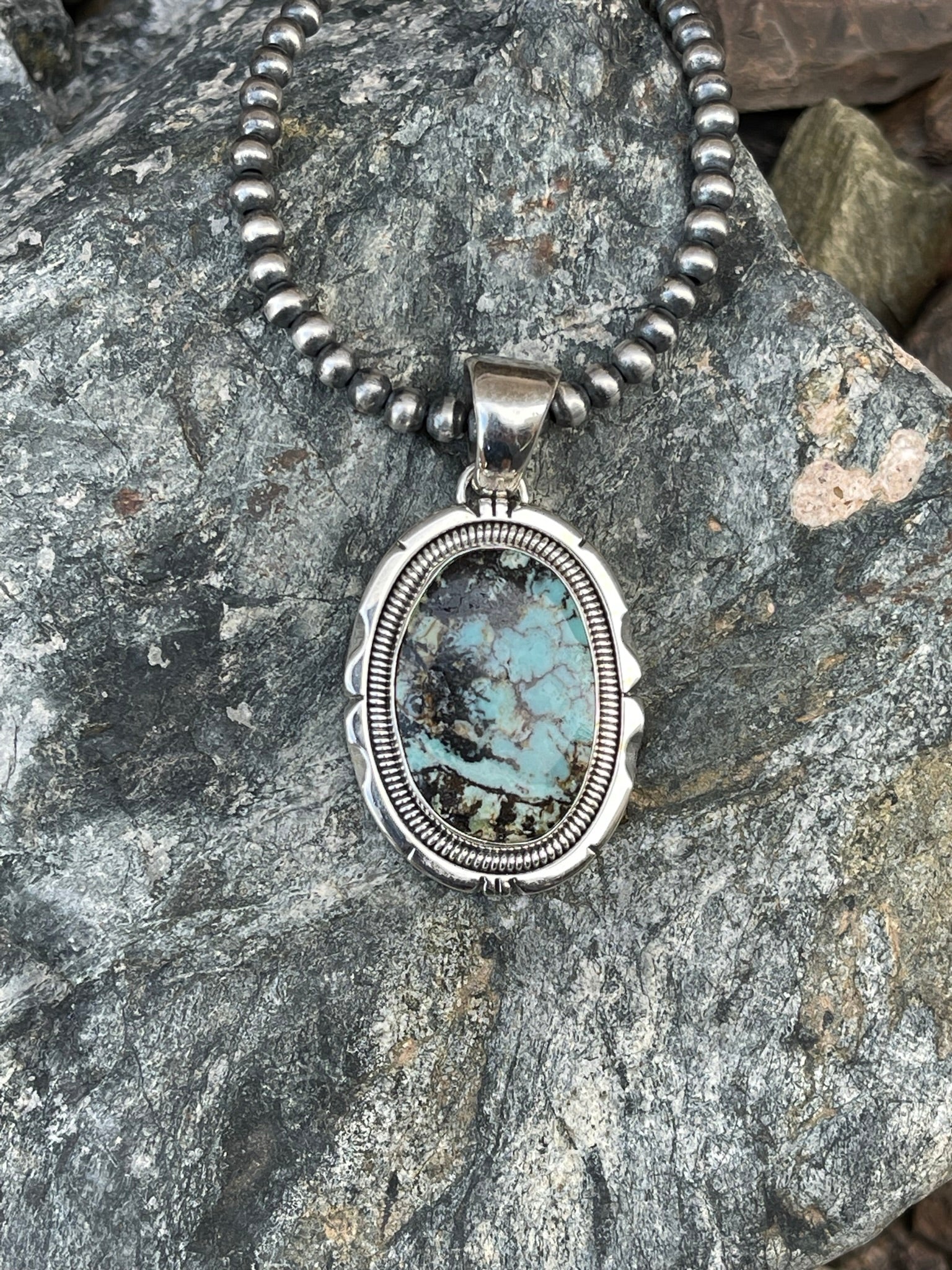 Hand Crafted Sterling Silver Stormy Mountain Turquoise Pendant with Coil Detail